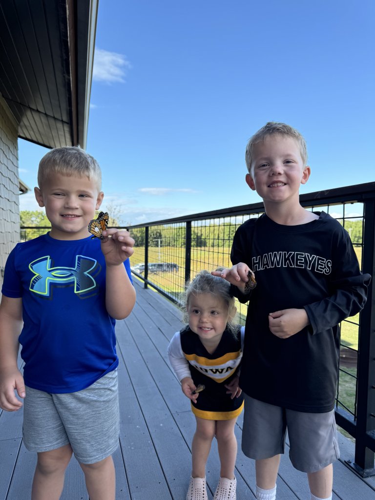BB Children holding tagged butterflies